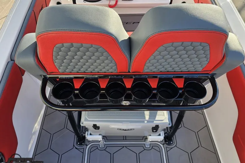 Slide: The Image of 2025 Concept 27' CC boat interior with red and gray seating, cup holders, and hexagonal flooring. - 55