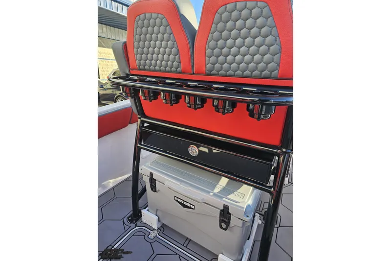 Slide: The Image of Red and gray seating with rod holders on 2025 Concept 27' CC boat. - 57