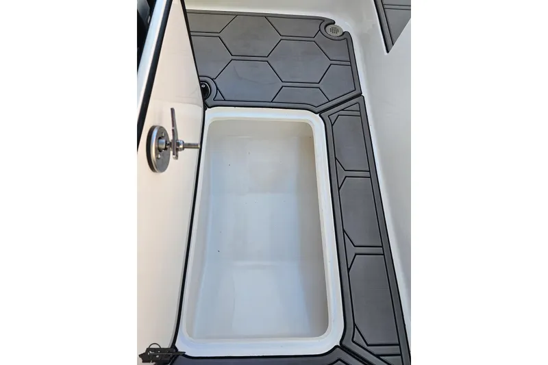 Slide: The Image of 2025 Concept 27' CC boat storage compartment with hexagonal floor design. - 64