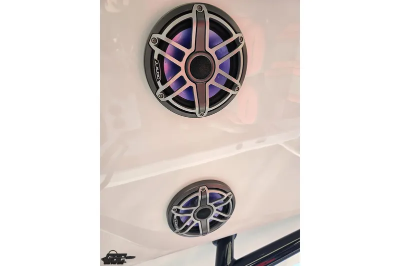 Slide: The Image of 2025 Concept 27' CC boat speakers with sleek design and purple lighting. - 73