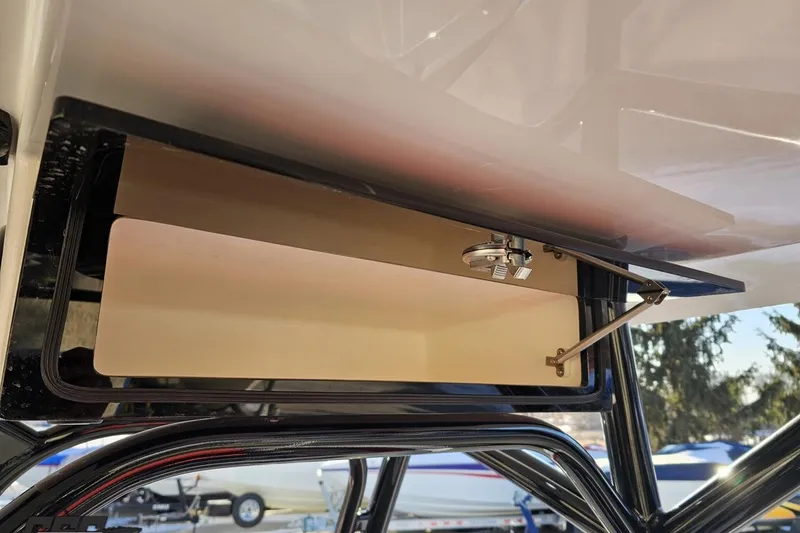 Slide: The Image of Storage compartment on 2025 Concept 27' CC boat, featuring sleek design and sturdy construction. - 74