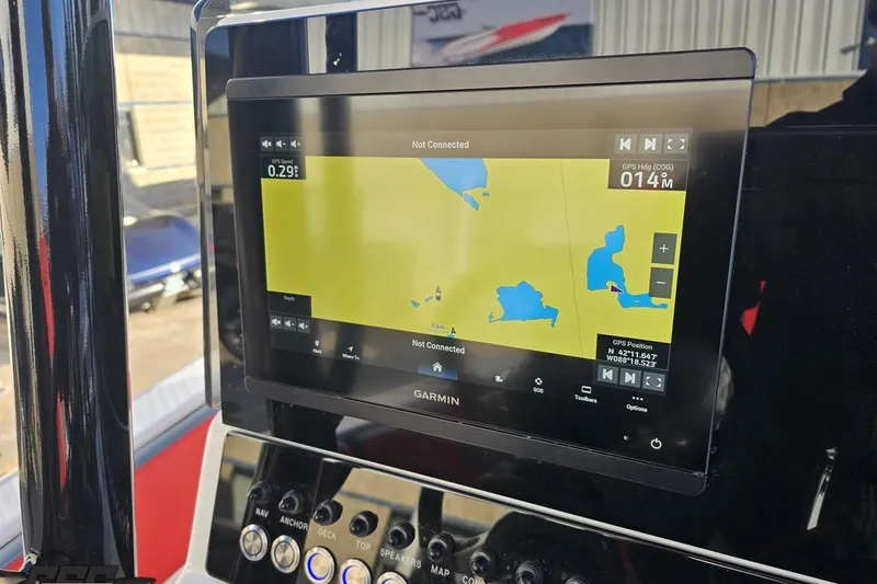 Slide: The Image of Garmin navigation display on 2025 Concept 27' CC boat, showing map and controls. - 77