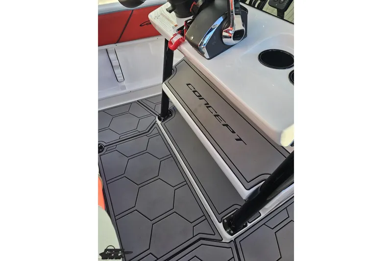 Slide: The Image of 2025 Concept 27' CC boat interior with hexagonal flooring and sleek console design. - 80