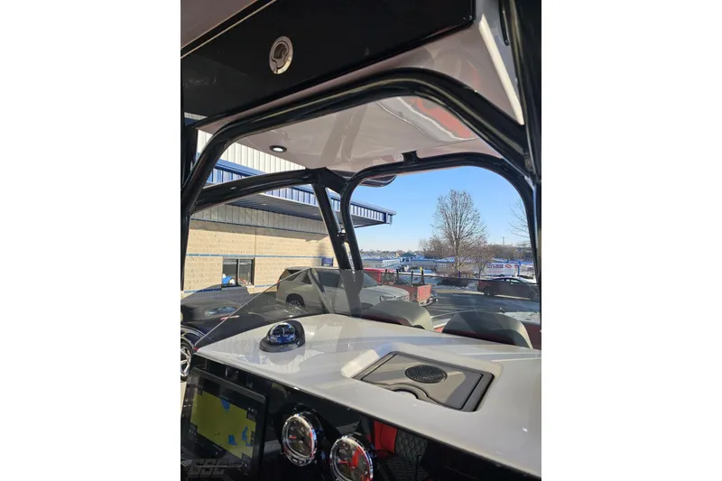 Slide: The Image of Interior view of 2025 Concept 27' CC boat dashboard with modern controls and navigation system. - 81