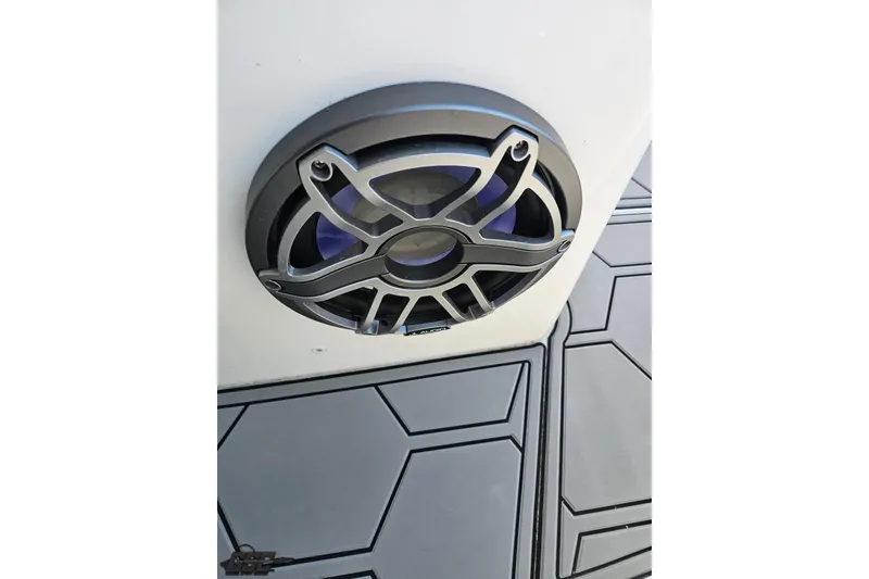 Slide: The Image of Speaker on 2025 Concept 27' CC boat with geometric flooring design. - 85