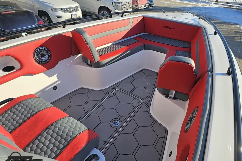 Slide: The Image of Luxurious 2025 Concept 27' CC boat interior with red and gray seating, hexagonal flooring. - 86