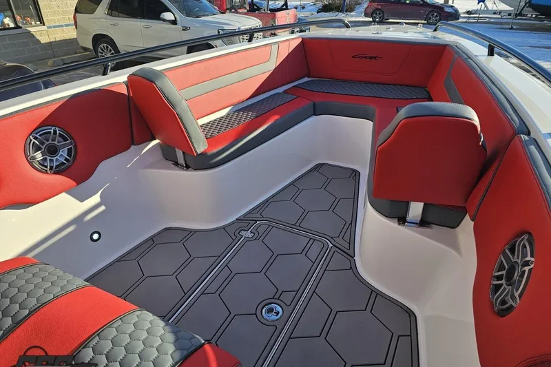 Slide: The Image of 2025 Concept 27' CC boat interior with red and gray seating, modern design. - 87