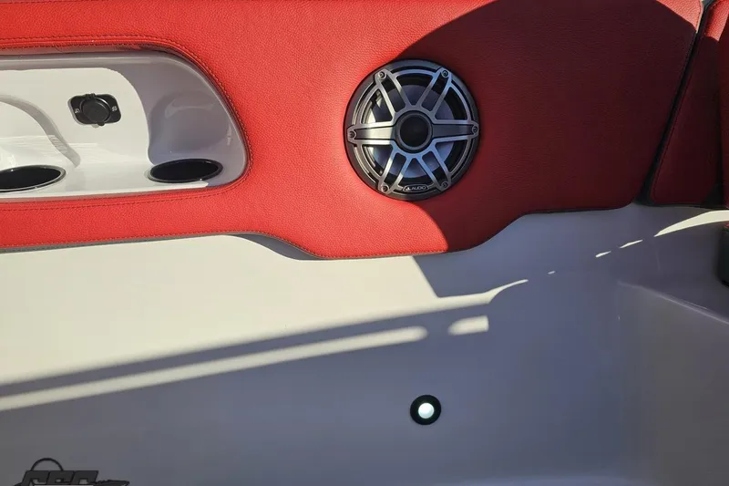 Slide: The Image of Red and white interior of 2025 Concept 27' CC boat with speaker detail. - 89