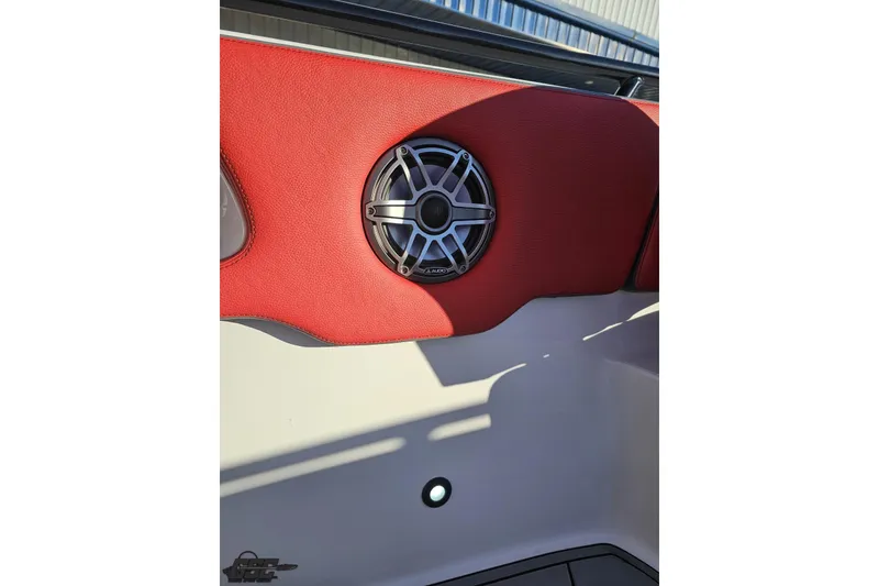 Slide: The Image of Red interior speaker detail on 2025 Concept 27' CC boat. - 90
