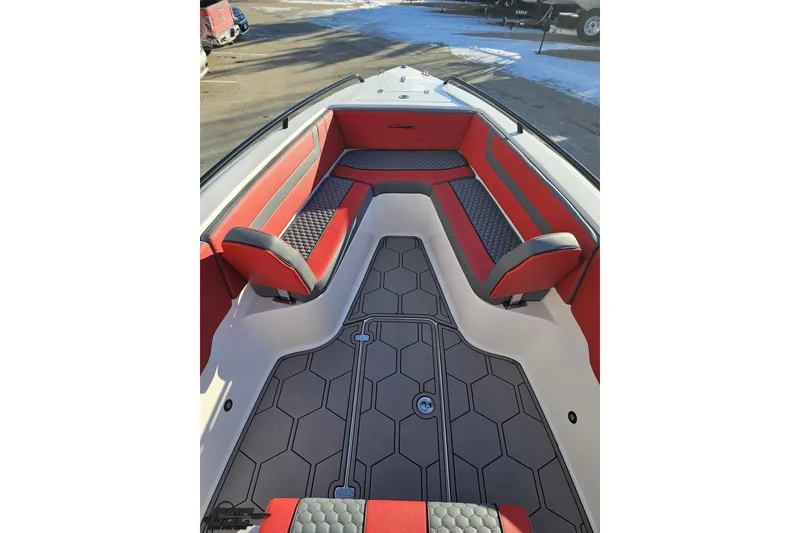Slide: The Image of 2025 Concept 27' CC boat interior with red and gray seating, hexagonal floor design. - 92