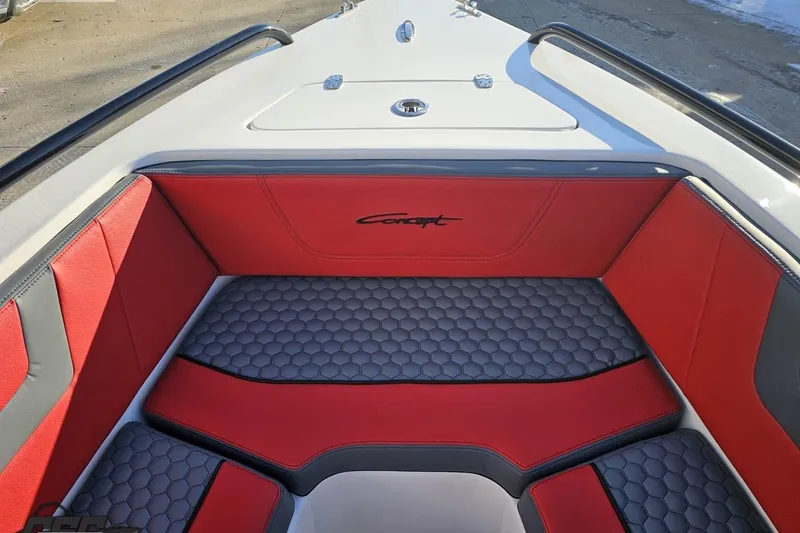 Slide: The Image of Red and gray interior of 2025 Concept 27' CC boat, featuring hexagonal pattern seating. - 97