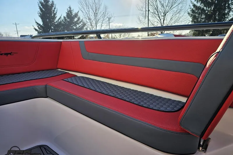 Slide: The Image of 2025 Concept 27' CC boat interior with red and gray cushioned seating. - 99