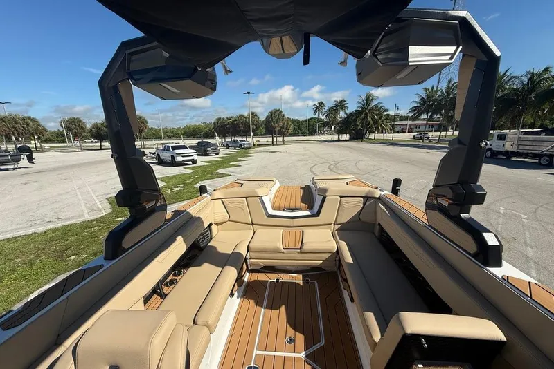 Slide: The Image of 2026 Nautique Super Air Nautique G25 Coastal Edition interior with luxurious seating and modern design. - 6