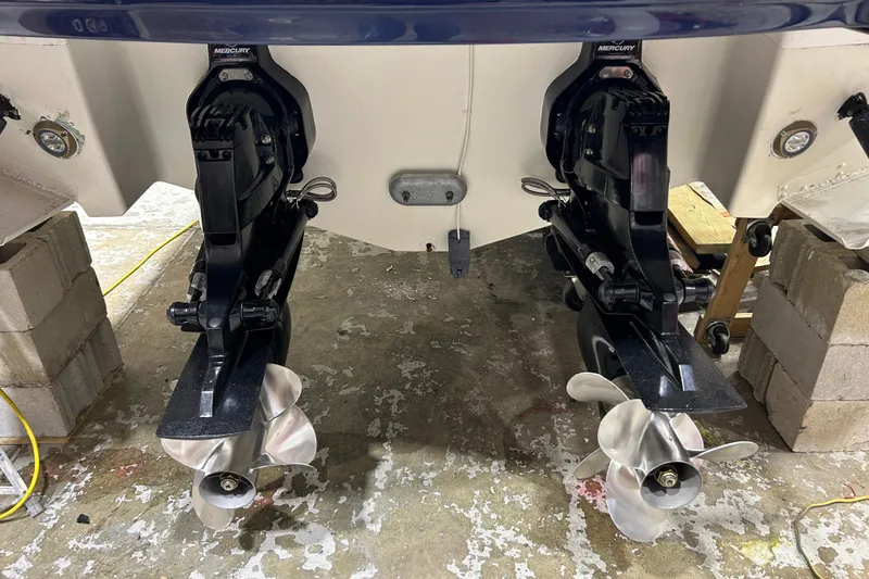 Slide: The Image of 2012 Chaparral 327 SSX boat with dual Mercury outboard engines and propellers. - 14