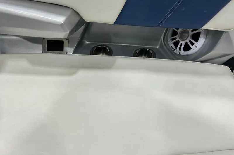 Slide: The Image of 2012 Chaparral 327 SSX interior with speaker and cup holders. - 26