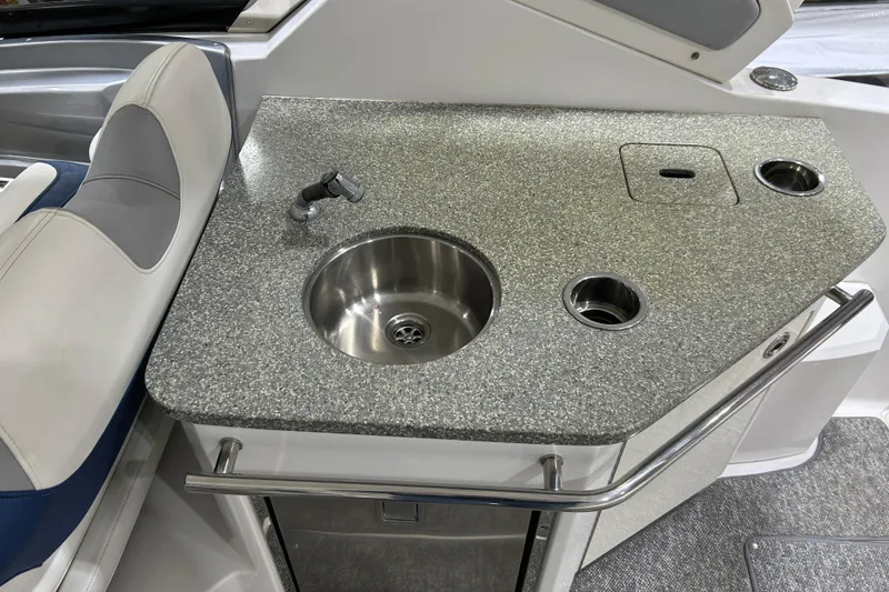 Slide: The Image of 2012 Chaparral 327 SSX boat interior with sink and countertop. - 46