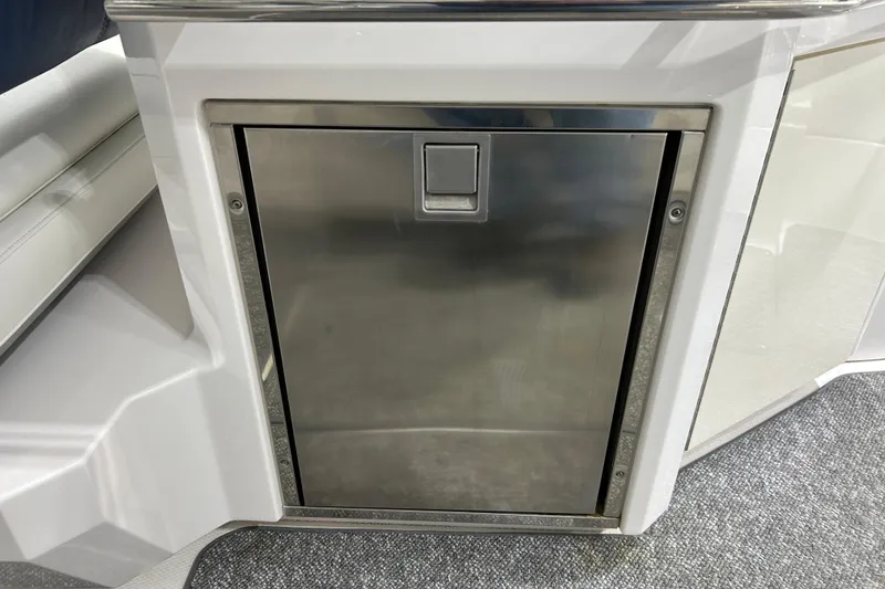 Slide: The Image of Stainless steel compartment on 2012 Chaparral 327 SSX boat interior. - 88