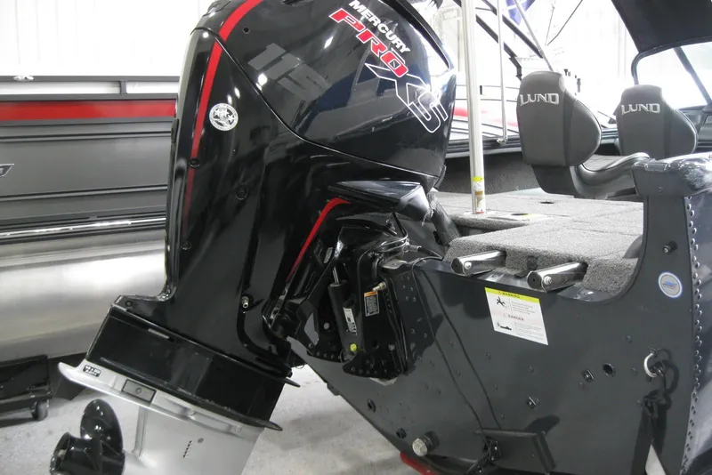 Slide: The Image of 2021 Lund 1875 Crossover XS boat with Mercury Pro XS outboard motor. - 4