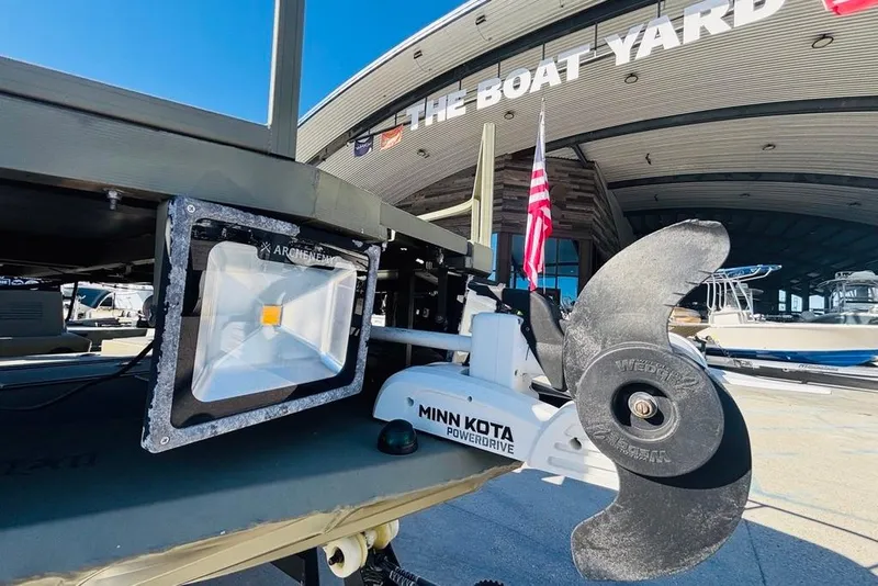 Slide: The Image of 2017 Tracker Grizzly 2072 MVX CC Sportsman with Minn Kota PowerDrive at boat yard. - 10