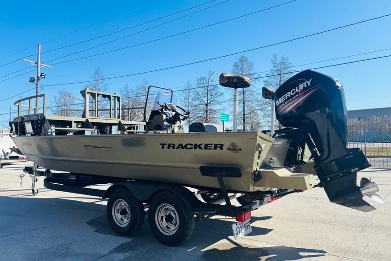 Slide: The Image of 2017 Tracker Grizzly 2072 MVX CC Sportsman boat with Mercury outboard motor on trailer. - 5
