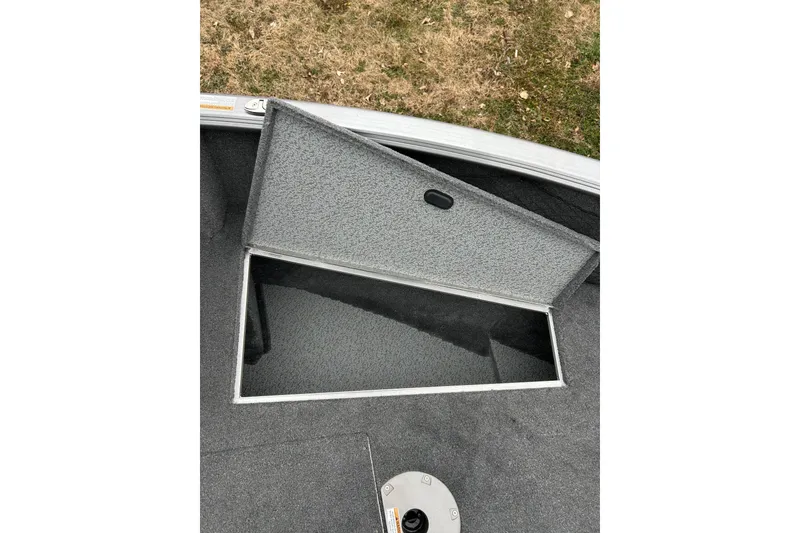 Slide: The Image of Open storage compartment on 2018 Lund 1775 Impact Sport boat. - 25