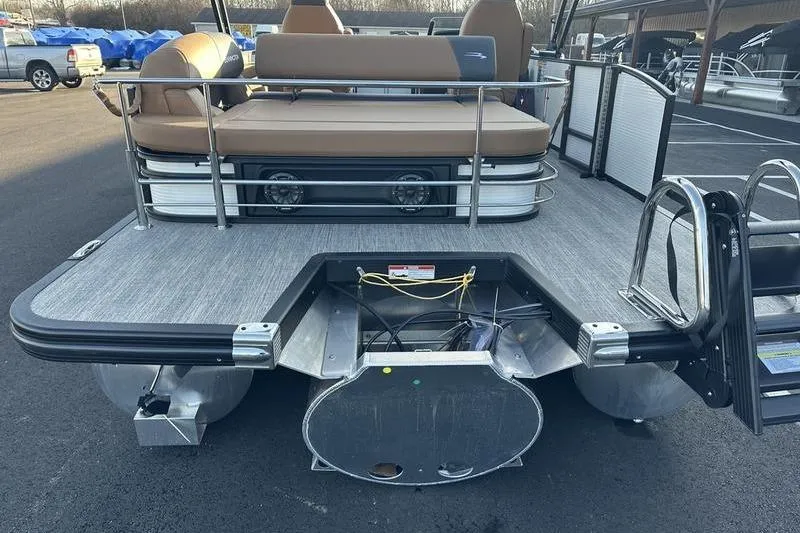 Slide: The Image of 2026 Bennington S Swingback 23 SSB ESP pontoon boat rear view with seating and ladder. - 10