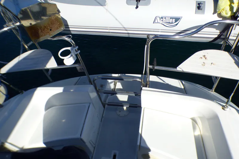 Slide: The Image of Cockpit view of 1994 Hunter Legend 35.5 sailboat with Achilles branding visible. - 24