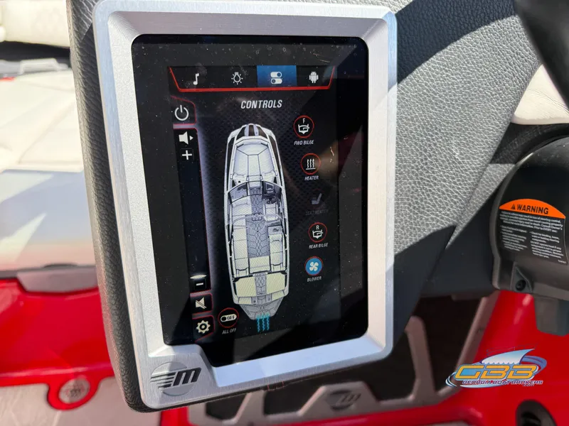 Slide: The Image of Touchscreen control panel in a 2021 Malibu M240 boat, displaying various system settings. - 35