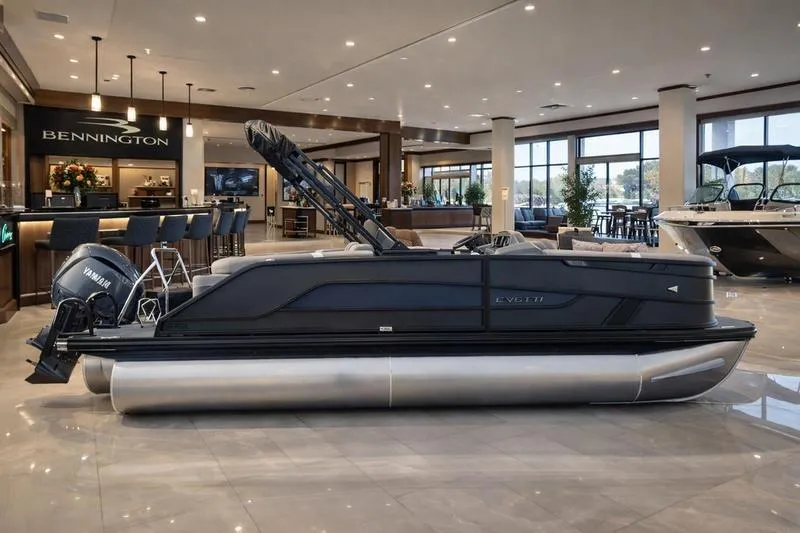 The Image of 2026 Evotti 521QL pontoon boat displayed in a luxurious showroom setting. - 1