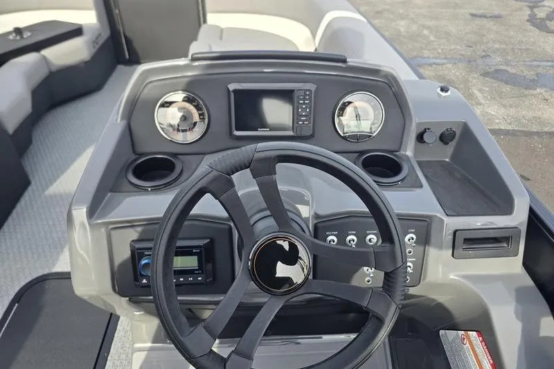 Slide: The Image of Dashboard of 2026 Evotti 521QL boat with steering wheel and control panel. - 8