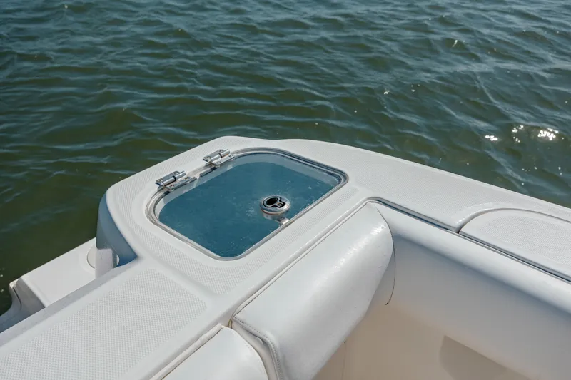 Slide: The Image of 2013 Boston Whaler 320 Outrage boat detail with water in background. - 27