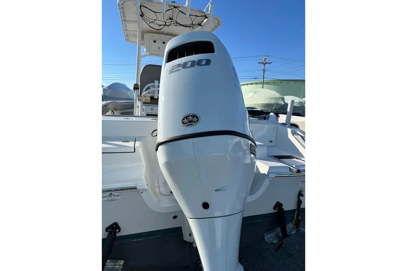 Slide: The Image of 2022 Sea Pro 219 Center Console boat with powerful 200 HP engine. - 10