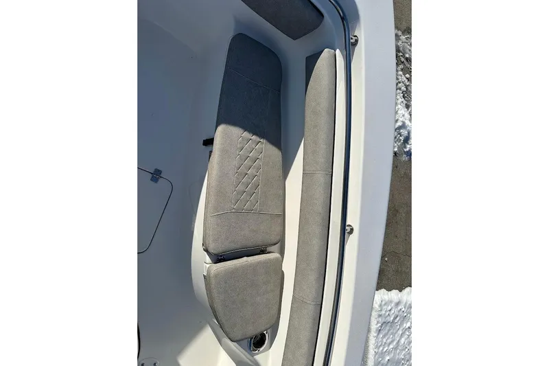 Slide: The Image of 2022 Sea Pro 219 Center Console boat interior with gray cushioned seating. - 23