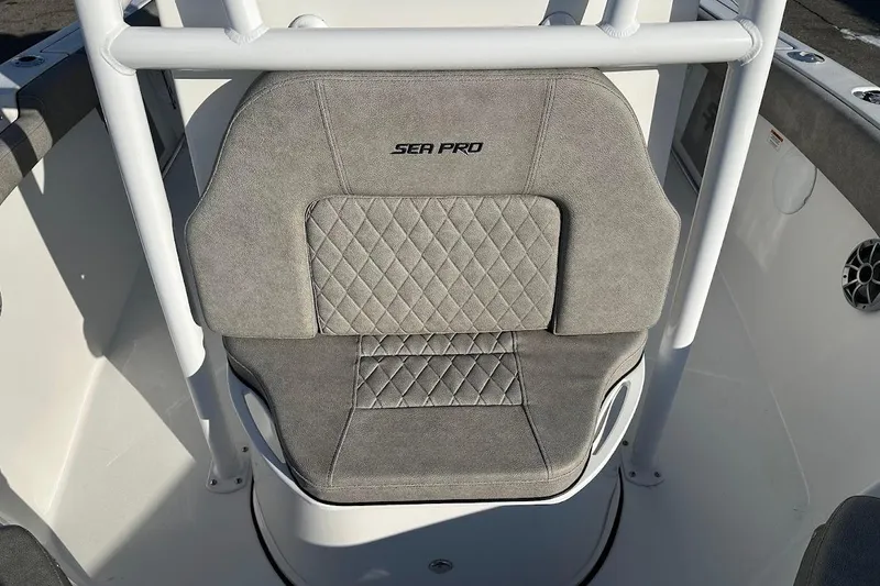 Slide: The Image of 2022 Sea Pro 219 Center Console boat seat with diamond-patterned upholstery. - 24