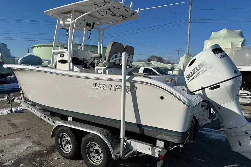 Slide: The Image of 2022 Sea Pro 219 Center Console boat on trailer with Suzuki outboard motor. - 3