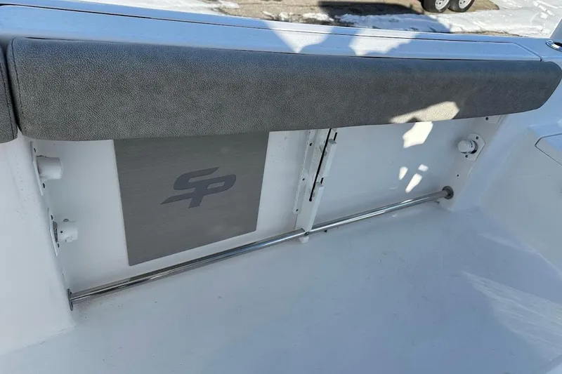 Slide: The Image of 2022 Sea Pro 219 Center Console interior with cushioned seating and logo detail. - 30