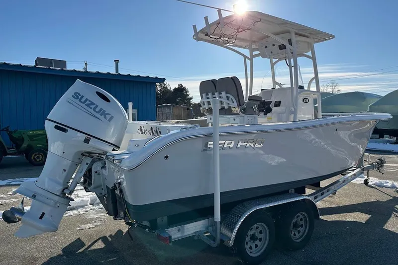 Slide: The Image of 2022 Sea Pro 219 Center Console boat with Suzuki outboard motor on trailer. - 5