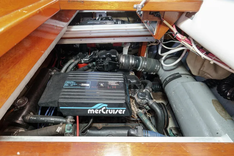 Slide: The Image of Engine compartment of a 1991 Windsor Craft 31 Sport Cruiser with MerCruiser engine. - 55