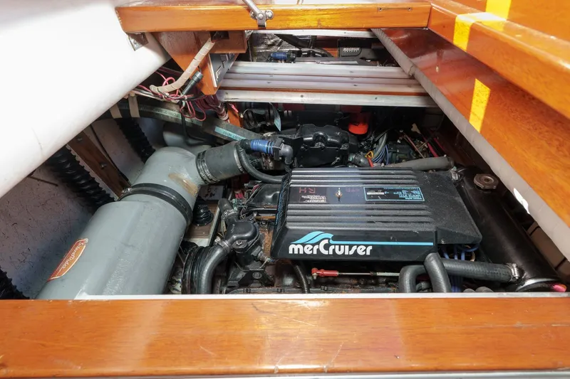 Slide: The Image of Engine compartment of a 1991 Windsor Craft 31 Sport Cruiser with MerCruiser engine. - 56
