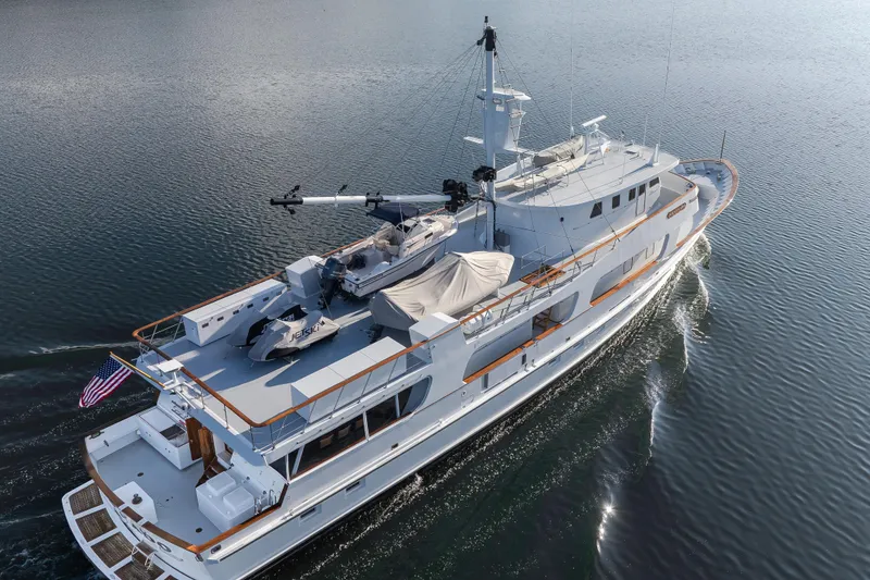 Slide: The Image of Aerial view of 1974 Willard 1201 yacht cruising on calm water. - 2