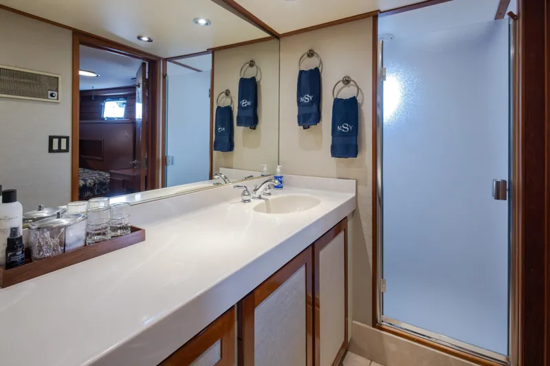 Slide: The Image of Luxurious bathroom in 1974 Willard 1201 yacht with modern amenities and elegant design. - 37