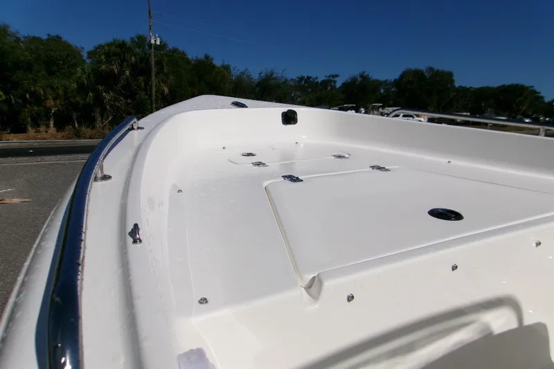Slide: The Image of 2026 Key West 1720 Center Console boat deck with stainless steel railings. - 10