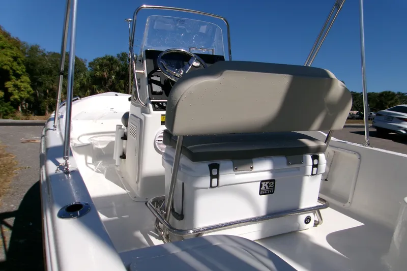 Slide: The Image of 2026 Key West 1720 Center Console boat interior with steering wheel and seating. - 7