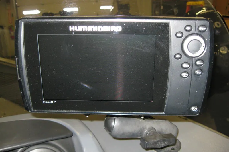 Slide: The Image of Humminbird Helix 7 fish finder on 2016 Lund 1775 Impact SS boat dashboard. - 12