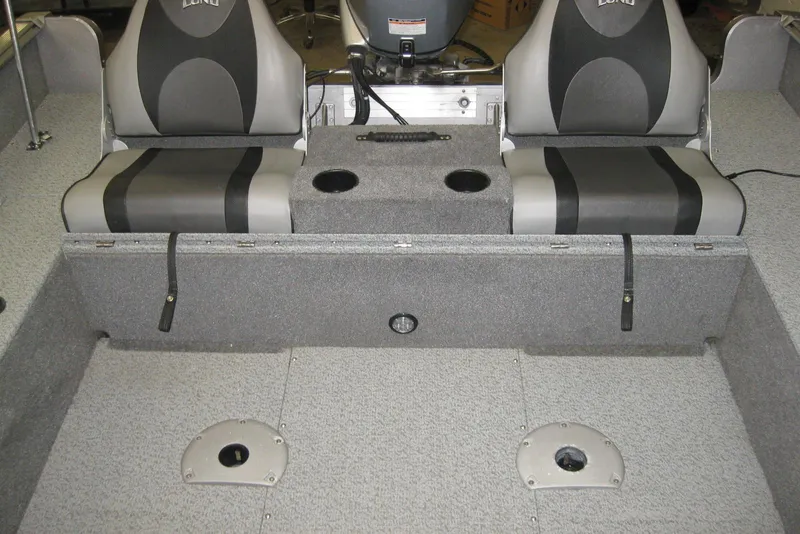 Slide: The Image of 2016 Lund 1775 Impact SS boat interior with dual seats and storage compartments. - 8