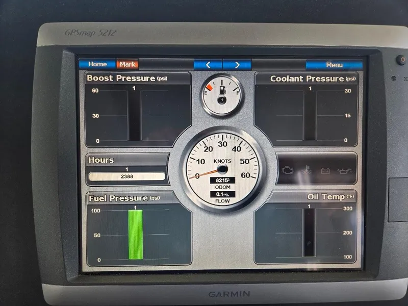 Slide: The Image of Garmin display showing engine metrics on a 2010 American Tug 49 Limited. - 36