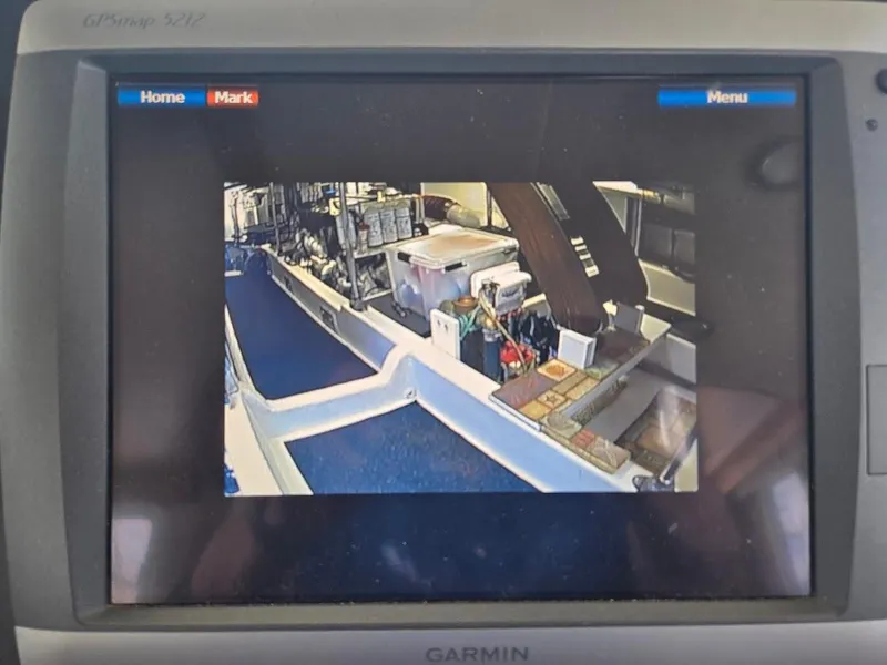 Slide: The Image of Garmin display showing interior view of 2010 American Tug 49 Limited boat. - 38