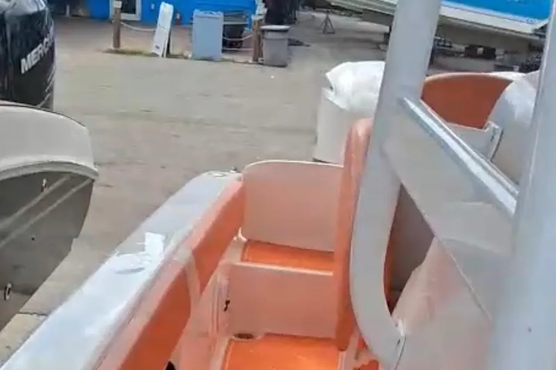 Slide: The Image of Electrical system setup in a 2006 Renegade 32 Cuddy boat, featuring wiring and control panels. - 11