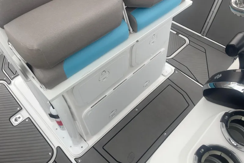 Slide: The Image of 2025 Hurricane Center Console 24 OB boat interior with seating and storage compartments. - 29