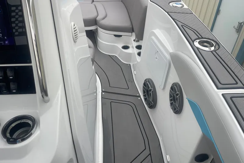 Slide: The Image of 2025 Hurricane Center Console 24 OB boat interior with modern seating and audio system. - 30